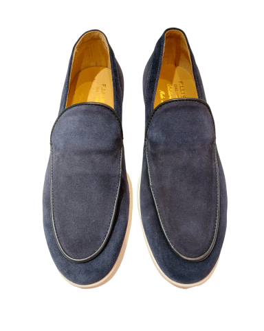 Soft, blue suede summer moccasins with white rubber soles, made in Italy.