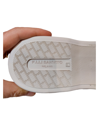 Soft, blue suede summer moccasins with white rubber soles, made in Italy.